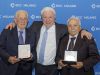 Il presidente Maino con due soci che sono da 50 anni parte della Banca